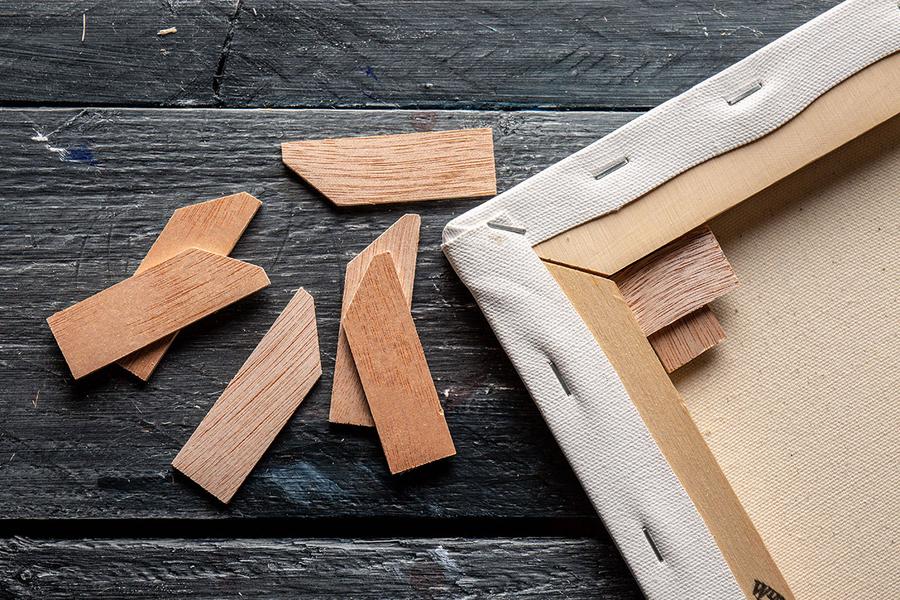 How does your canvas got stretched in a frame store?